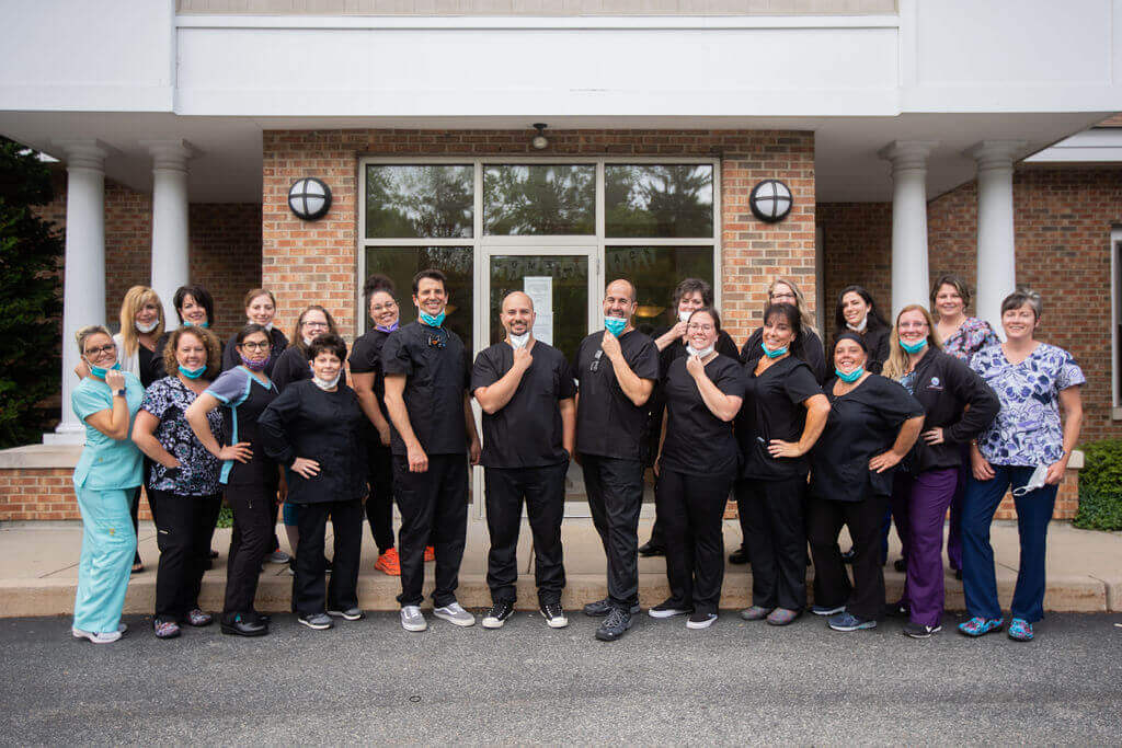 Group photo of RI Dental Arts staff 